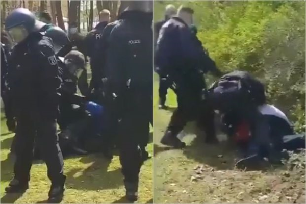 Almaniyada aksiyaçılara qarşı polis zorakılığı